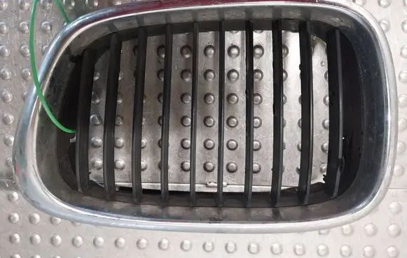Front bumper upper radiator grill