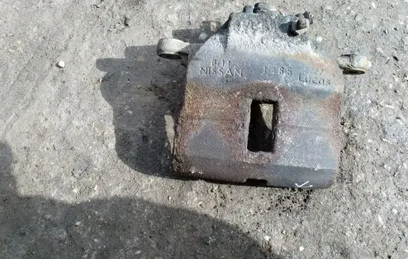 Nissan Almera N16 Front brake caliper