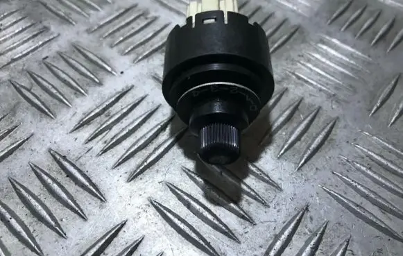 Mitsubishi Colt Headlight level height control switch