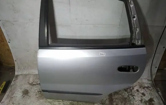 Nissan Almera Tino Rear door PILKOS