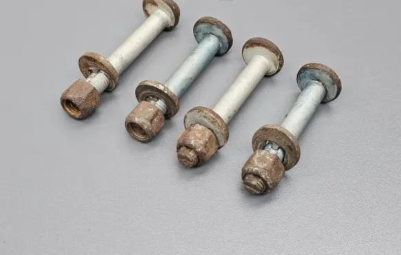 Front suspension camber bolt