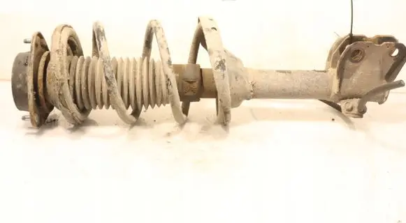 Subaru Legacy Front shock absorber with coil spring