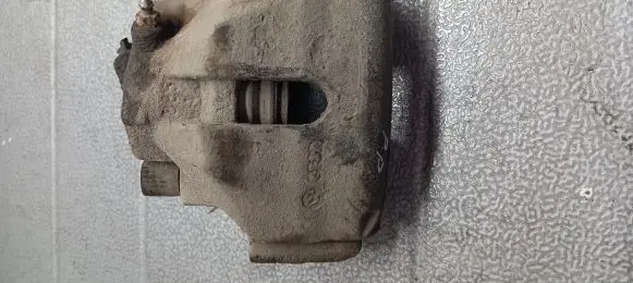 Volkswagen PASSAT B5 Front brake caliper