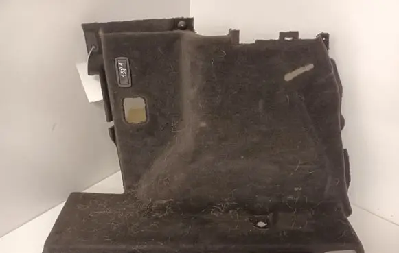 Trunk/boot lower side trim panel