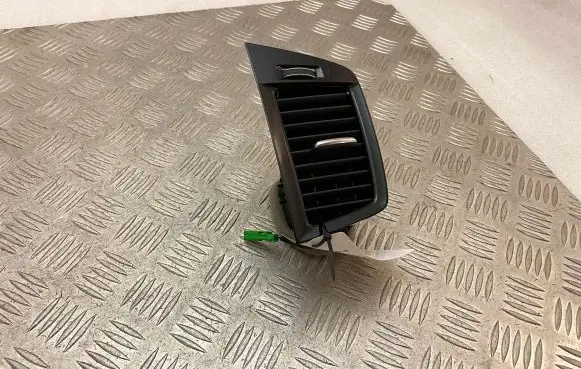Dash center air vent grill
