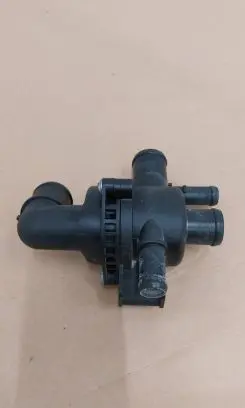 Thermostat/thermostat housing