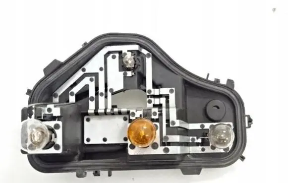 Tail light bulb cover holder