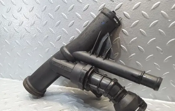 Skoda Octavia Mk3 (5E) Engine coolant pipe/hose 04L121071E 04L121026F