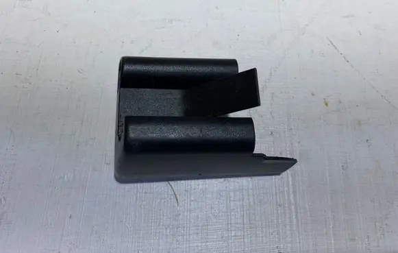 Front passenger seat rail trim