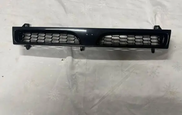 Nissan Sunny Front bumper upper radiator grill