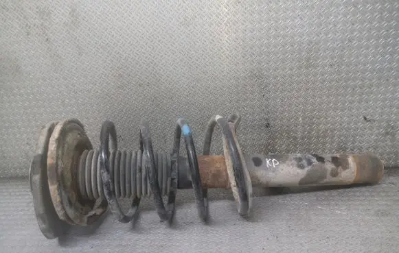 Front shock absorber with coil spring