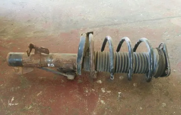 Mazda 3 II Front shock absorber/damper BBM234700A