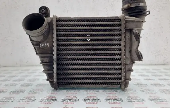 Volkswagen Golf IV Intercooler radiator 1J0145805D