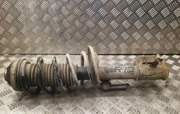 Opel Zafira B Front shock absorber with coil spring
