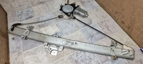 Suzuki Liana Front door window regulator with motor 8343076F10 0621009291