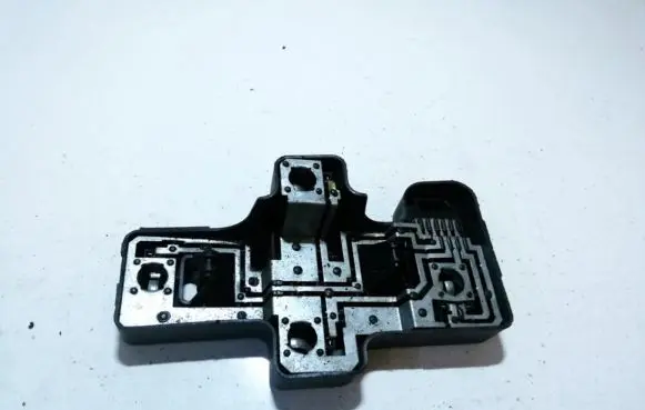 Tail light bulb cover holder