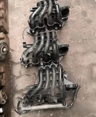 Volkswagen Golf IV Intake manifold 036129711