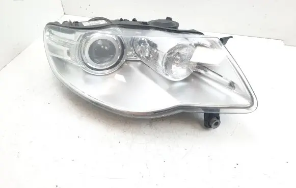 Volkswagen Touareg I Headlight/headlamp 7L6941032C