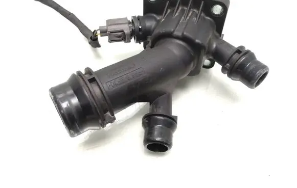 Thermostat/thermostat housing