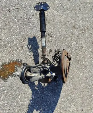 Rear wheel hub spindle/knuckle