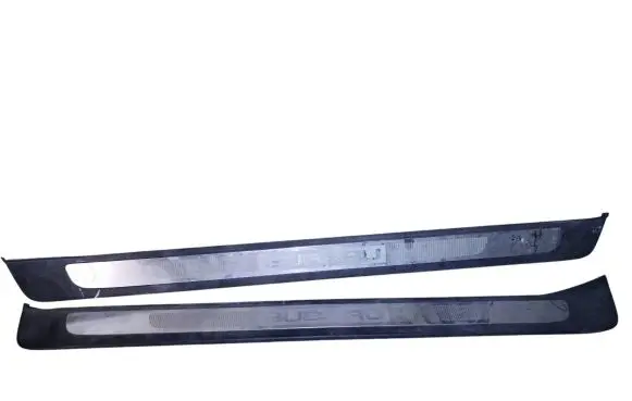 Subaru Legacy sill trim set (inner) 94060AG080 94060AG070
