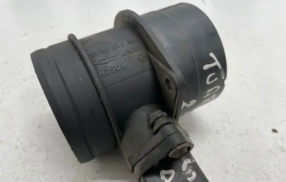 Volkswagen Touareg I Mass air flow meter 0986284007 0281002461