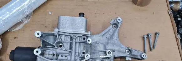 Audi A5 Oil filter mounting bracket 06L903143D