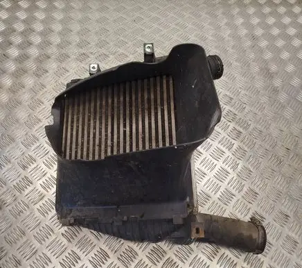 Volkswagen Touareg I Intercooler radiator 7L0117340