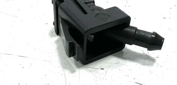 Windshield washer spray nozzle