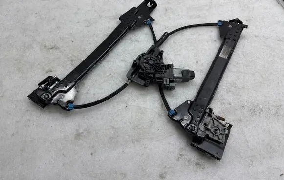 Rear door window regulator with motor