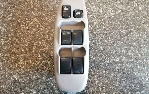 Nissan Almera Tino Electric window control switch 80961BU400
