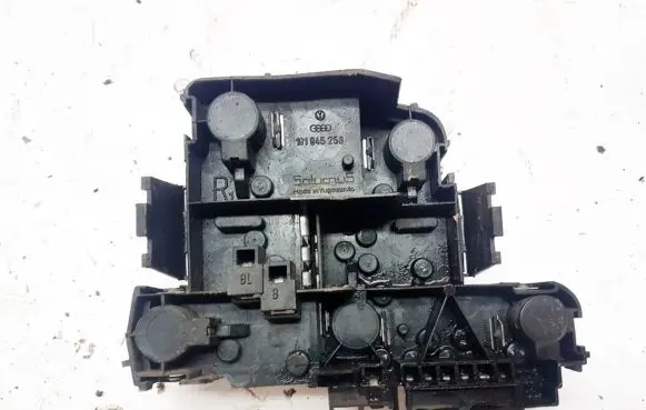 Tail light bulb cover holder