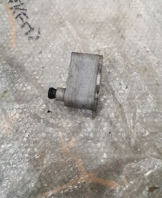 Volkswagen PASSAT B7 USA Engine oil radiator 06K117021