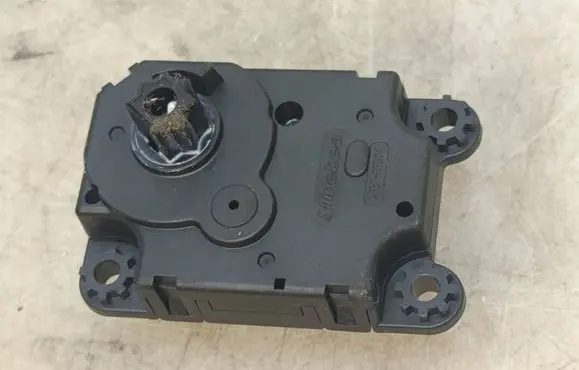 Opel Corsa F Air flap motor/actuator 16000458 TB1102 HAD36011A