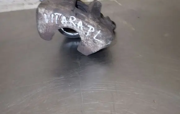 Suzuki Grand Vitara II Front brake caliper