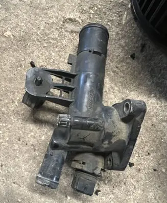 Thermostat/thermostat housing
