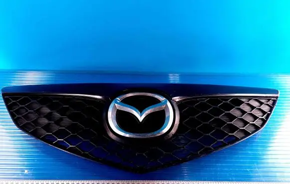 Mazda 3 I Front bumper upper radiator grill BR5T501U1 BR5S501U1