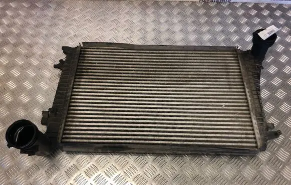 Volkswagen Touran I Intercooler radiator 1K0145803Q