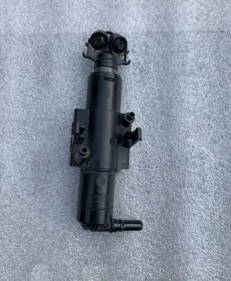 Ford Kuga II Windshield washer spray nozzle GV4113L014AE
