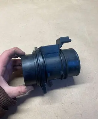 Renault Laguna II Mass air flow meter 7700314057 11880912 5WK9609