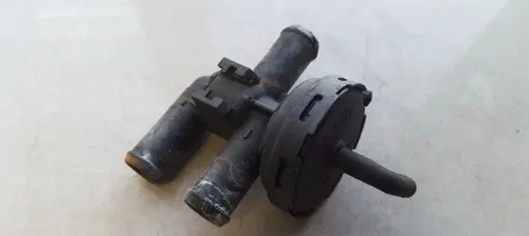 Coolant heater control valve