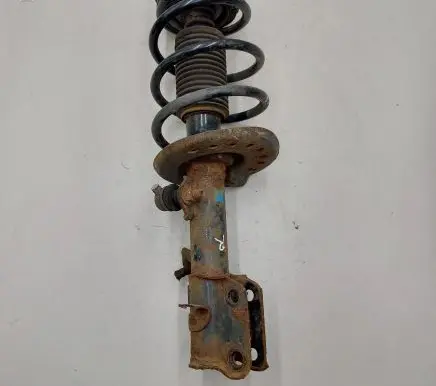 Front shock absorber with coil spring