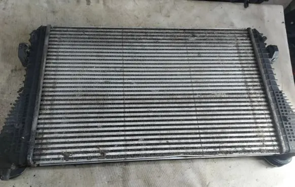 Volkswagen Touran I Intercooler radiator 1K0145803L