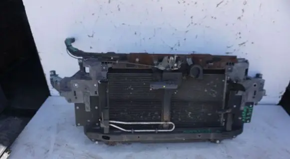 Radiator support slam panel