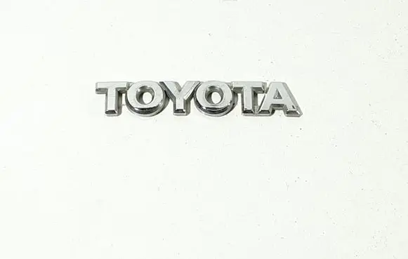 Toyota Corolla E120 E130 Manufacturers badge/model letters