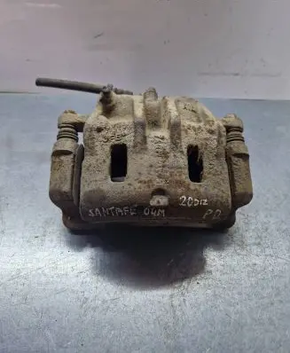 Hyundai Santa Fe Front brake caliper 86412035