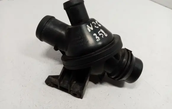 Thermostat/thermostat housing