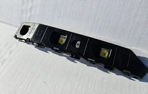 Hyundai Tucson IV NX4 Rear bumper mounting bracket 86654N7000