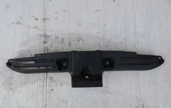 Engine bonnet/hood lock trim molding