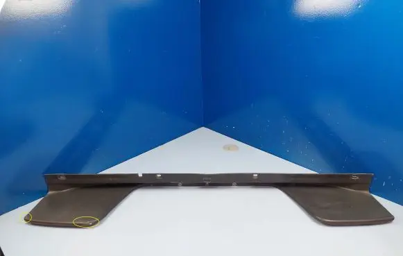 Rear bumper trim bar molding